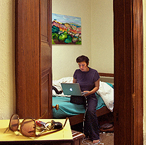 View from the common area into a bedroom of a double suite.