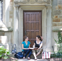 Students outside a residential entry to the dorms.