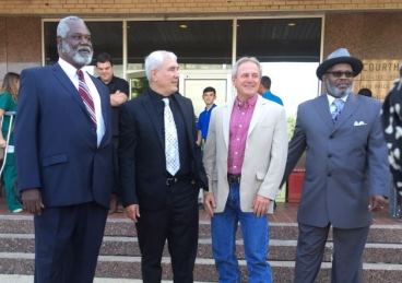 Kerry Max Cook (second from left) stood with exonerees A.B. Butler (left), Michael Morton and Billy Smith outside  the Smith County Courthouse in Tyler on Monday